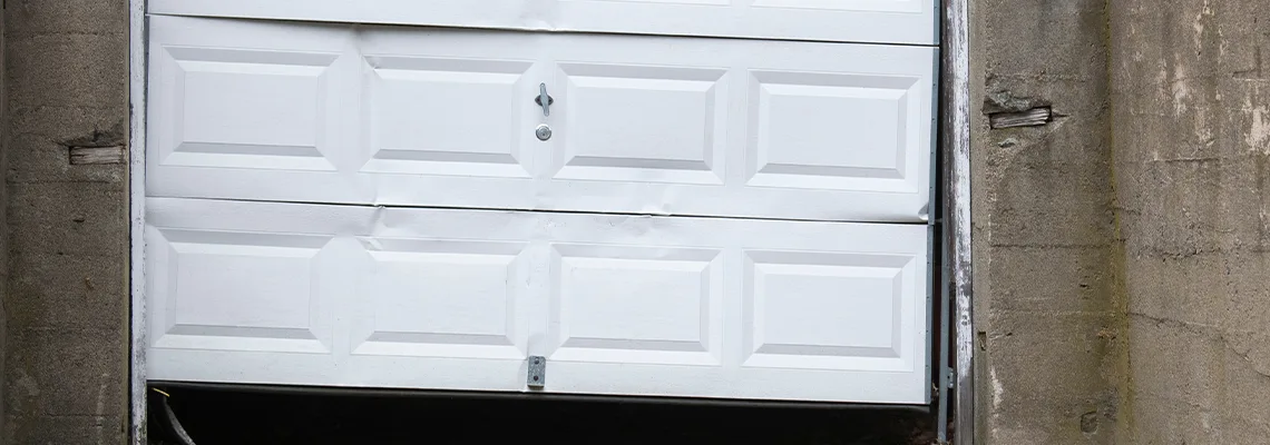 Garage Door Got Hit By A Car Dent Removal in O'Fallon, IL