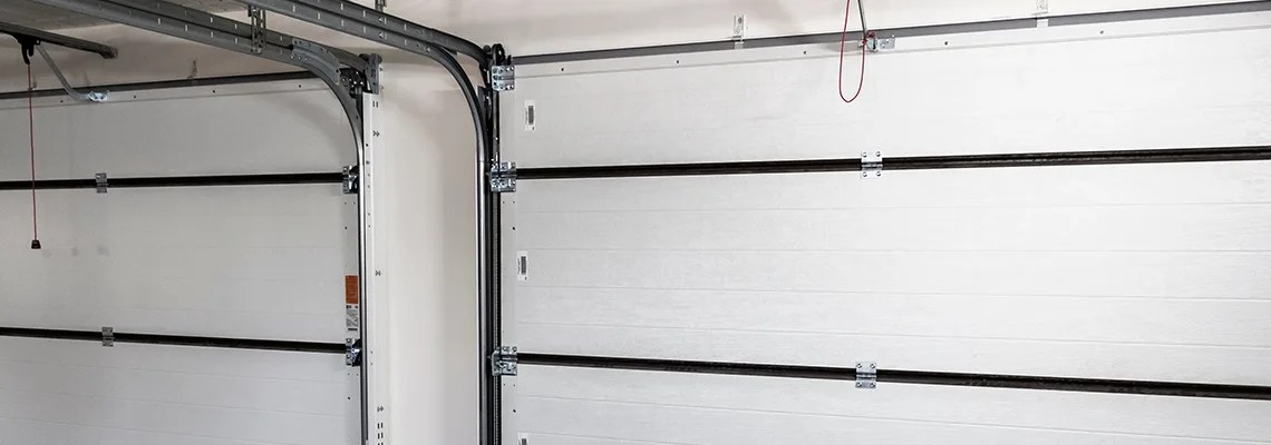 Fix Folding Garage Door Jerking in O'Fallon, Illinois